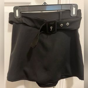 I am selling a super cute black skort from Dee Dee! Never been worn!